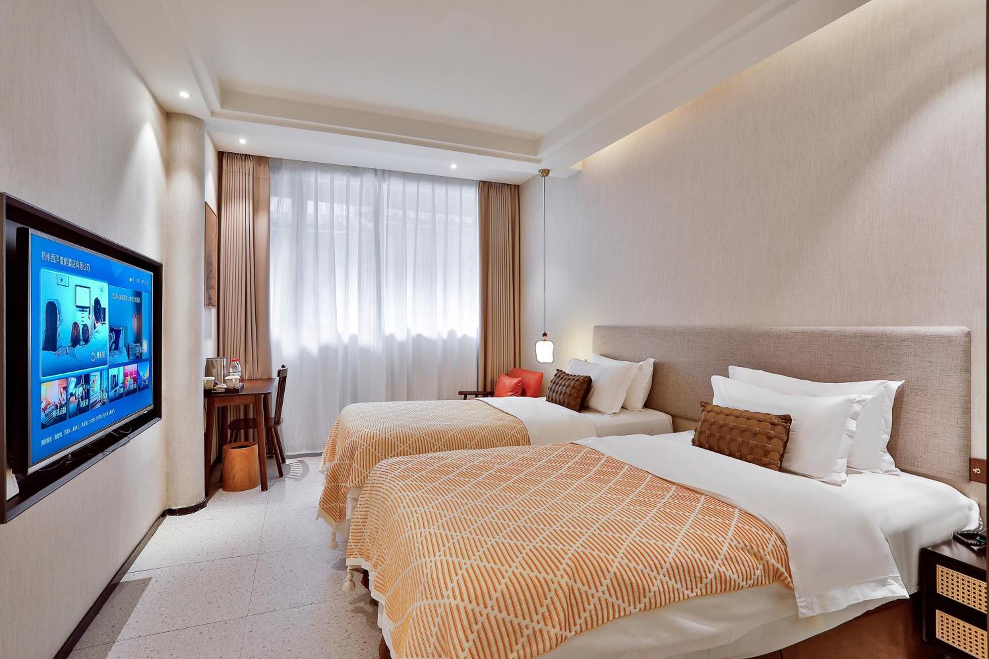 Yurong West Lake Cottage Resort Hotel Hangzhou Exterior photo